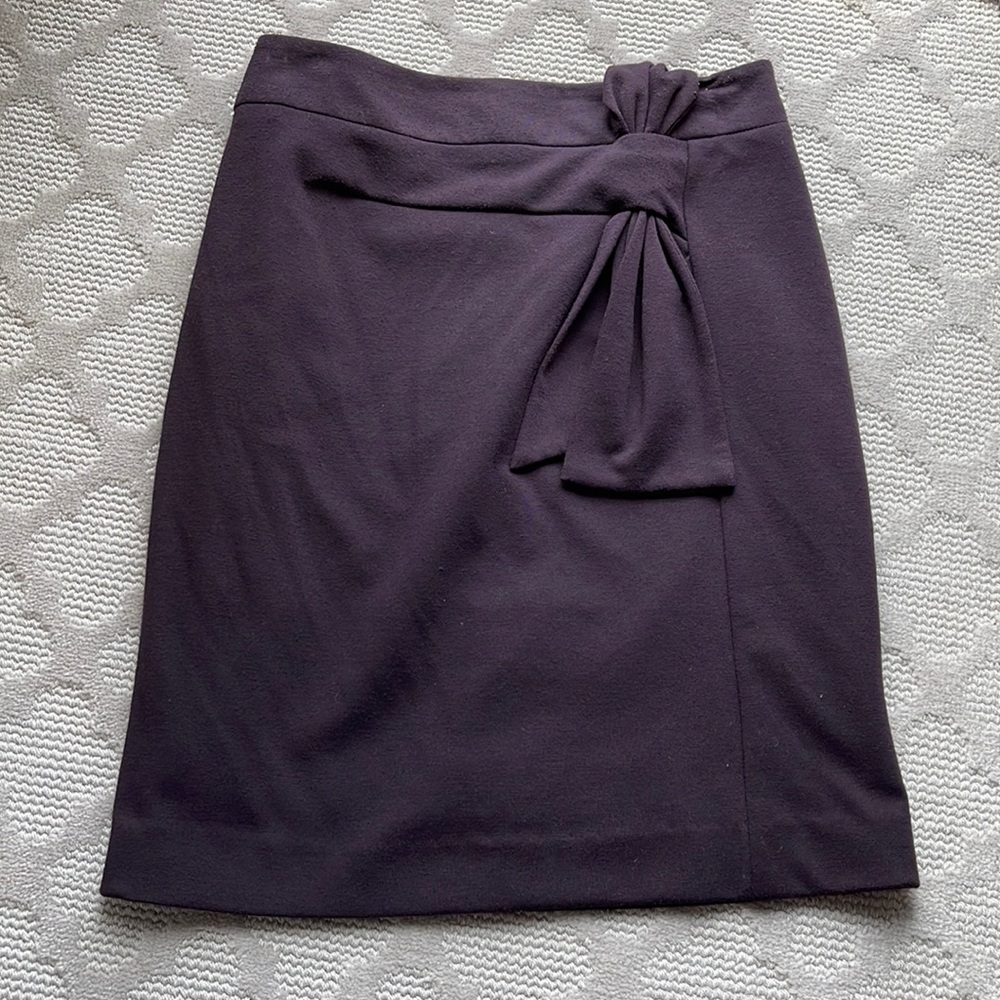 Dark purple skirt with bow detail